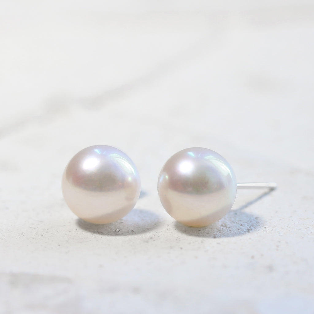 ホワイト×オーロラcolor✳︎ファルファーレ✳︎シュリンクパールピアス